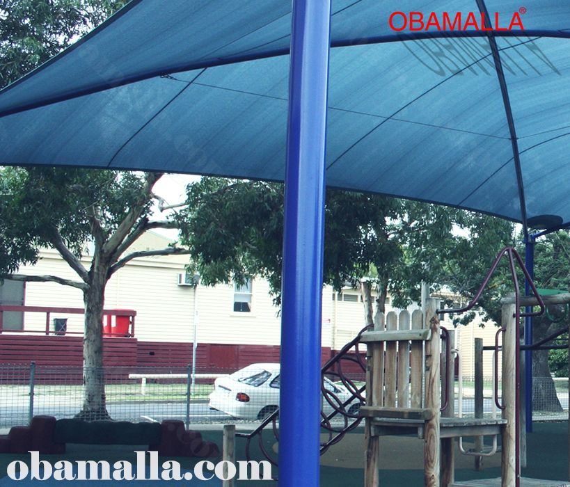malla de sombreado instalada en parque sobre juegos infantiles.